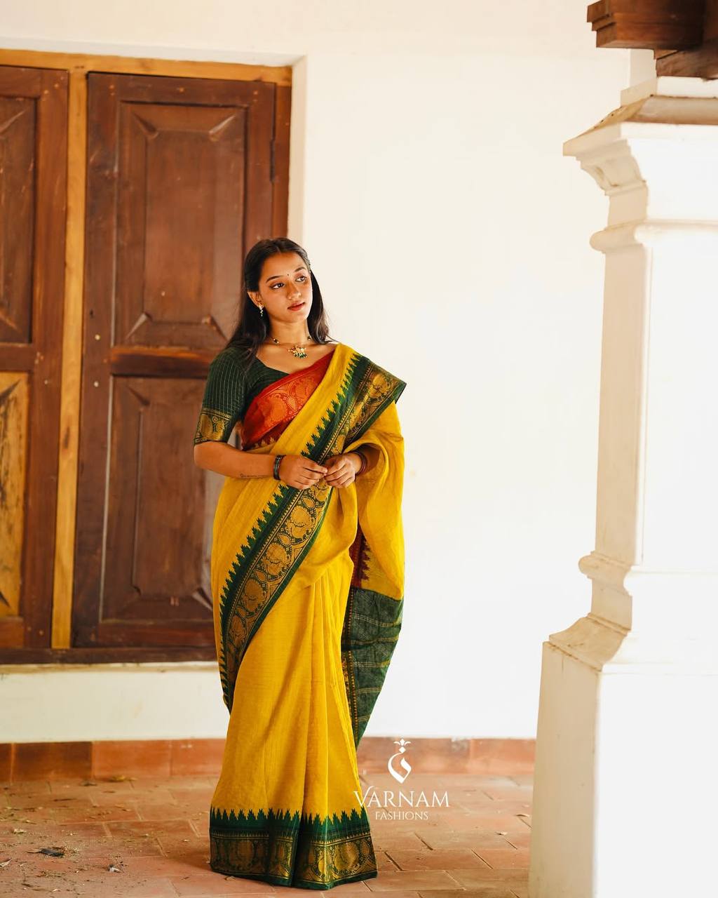 Elegant Mustard Yellow & Forest Green Kanchipuram Silk Saree with Traditional Peacock Zari Border