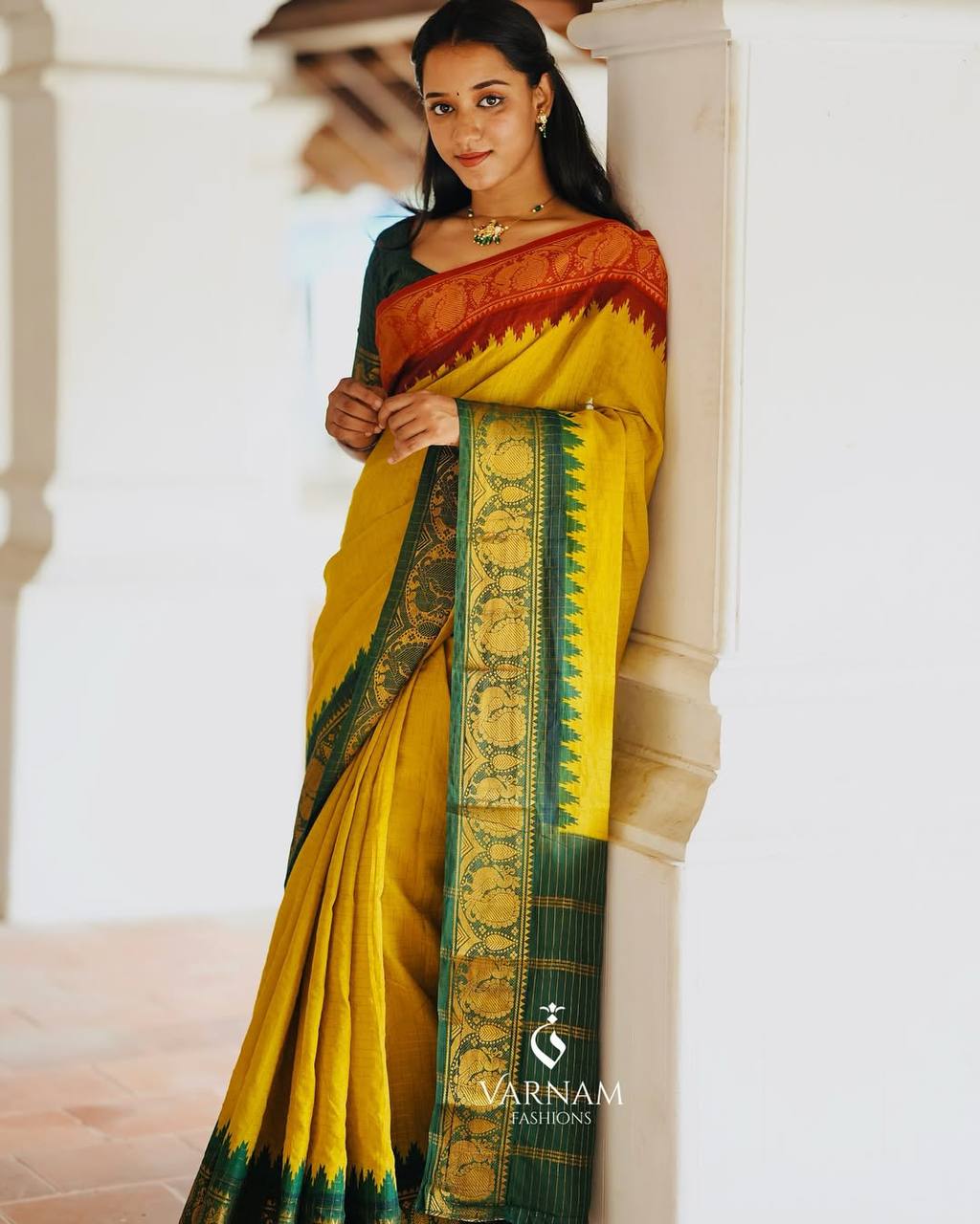 Elegant Mustard Yellow & Forest Green Kanchipuram Silk Saree with Traditional Peacock Zari Border