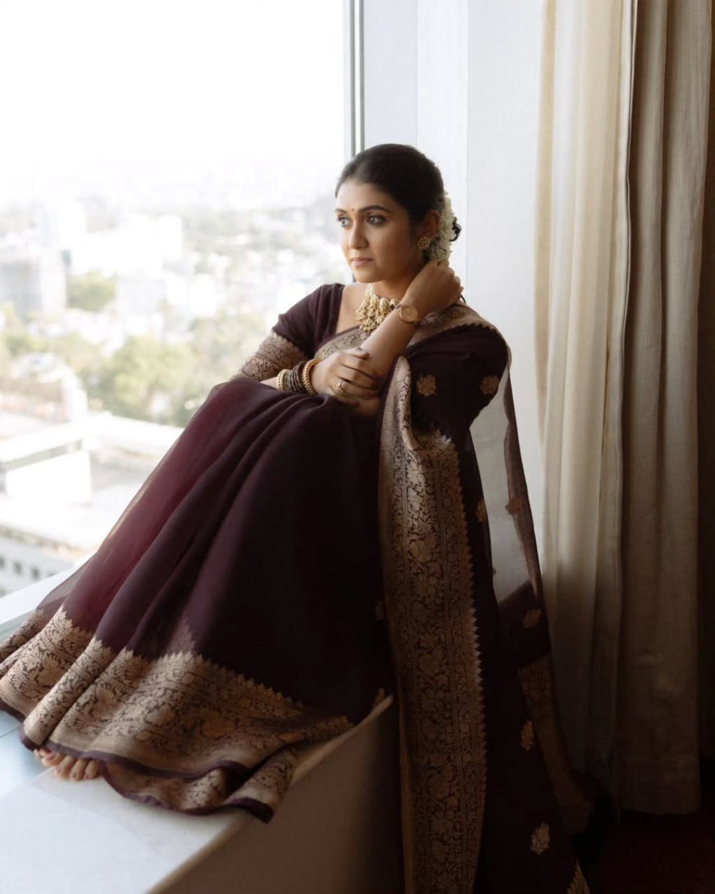 Praveena - Maroon Organza Silk Saree with Floral Zari Motifs and Brocade Border