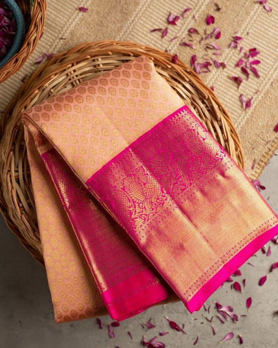Vrishti - Peach Soft Banarasi Silk Saree with Pink Jacquard Zari Border